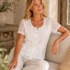 KAV26140-04-lifestyle Kalisson white textured cotton top with sheer sleeves