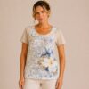 KAV26174-01-front Kalisson beige floral print cotton top with blue floral artwork