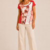 studio_fashion_photo_on_a_plain_beige_tan_backgrou