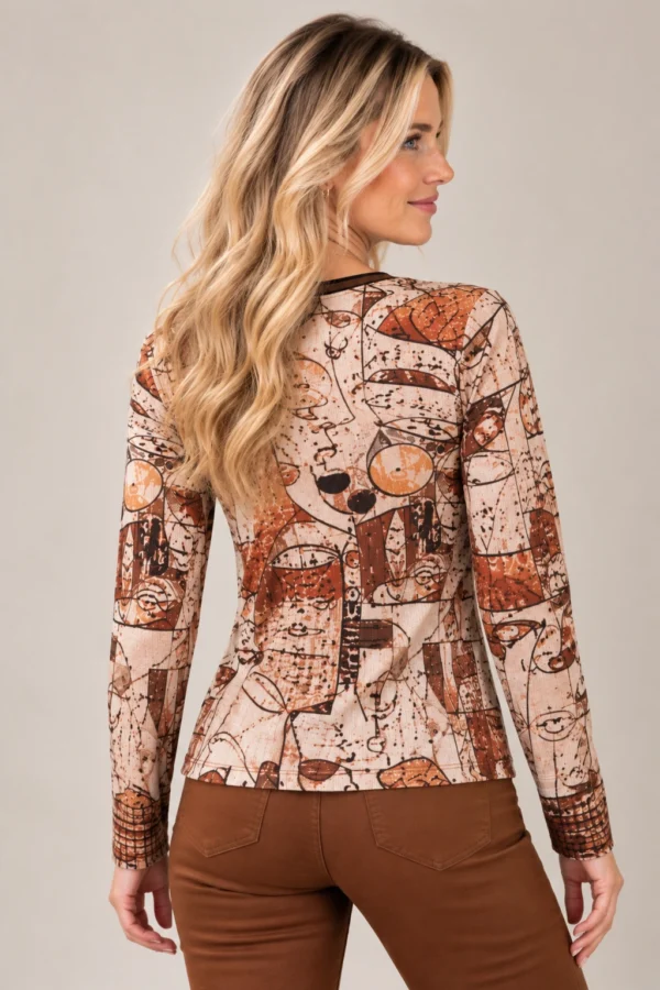 02: womens-abstract-face-print-top.webp Women's abstract face print long-sleeve top in beige, rust, brown and black tones