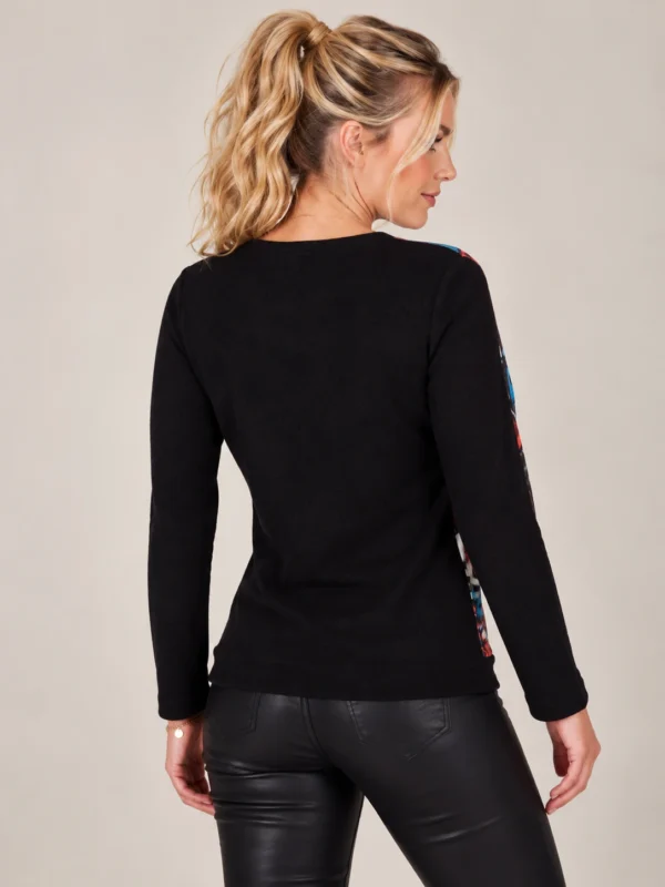 02womens-multicolour-printed-knit-top.webp Kalisson Women's multicolour printed knit top with black sleeves and decorative gold-tone buttons