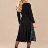 02black-botanical-print-midi-dress.webp Black long sleeve midi dress with multicolour botanical print