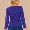 02purple-stud-detail-long-sleeve-top.webp Purple long sleeve top with metallic stud detailing around the neckline and shoulders
