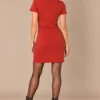 04rust-suede-effect-short-sleeve-dress.webp Rust suede-effect short sleeve dress with diagonal seams and decorative zip details