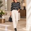 DI_4120P_5_lifestyle Kalisson black cream striped knit sweater front upper body view
