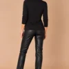 ka-20i049-black-cotton-top-back-full-body Kalisson black cotton patterned top, upper-body front view.