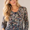 womens-multicolour-geometric-mosaic-top-01-front-upper-body Women's multicolour geometric mosaic long-sleeve top with navy neckline detail